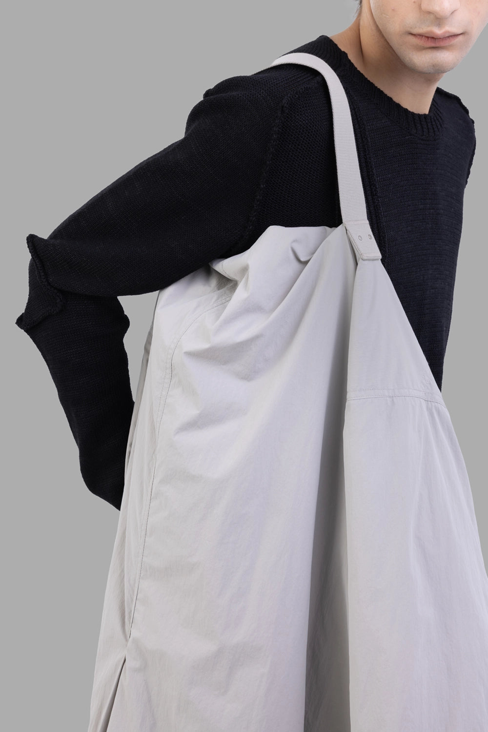 Rick Owens coat in Pearl, hardware close-up, webbing strap with rivets