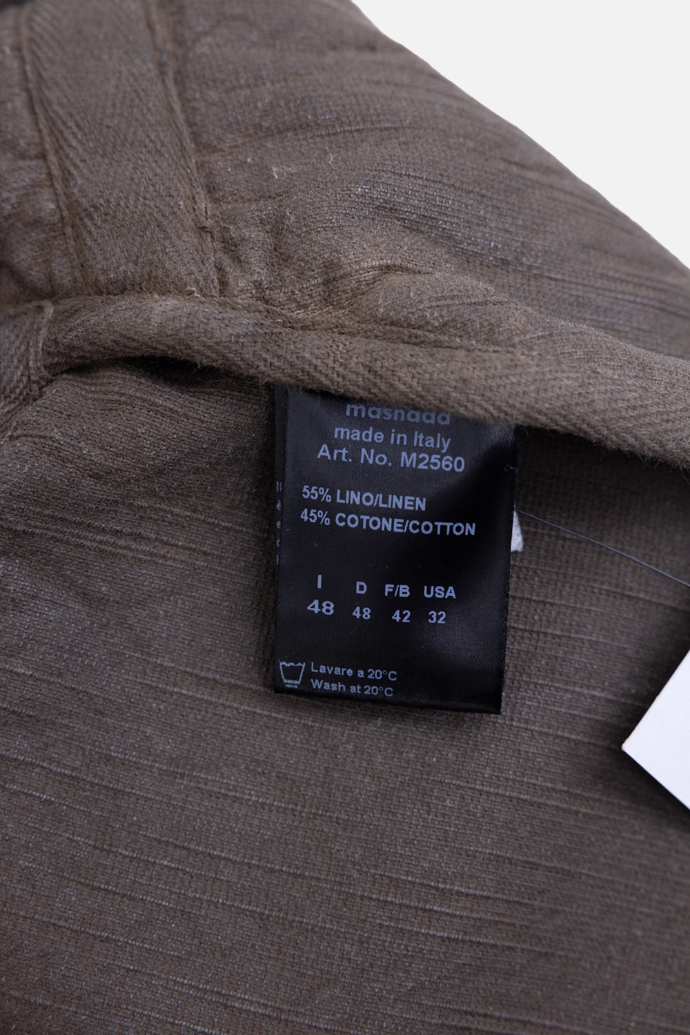 Pre-owned Masnada coat in taupe, detail view, interior care label and stitching