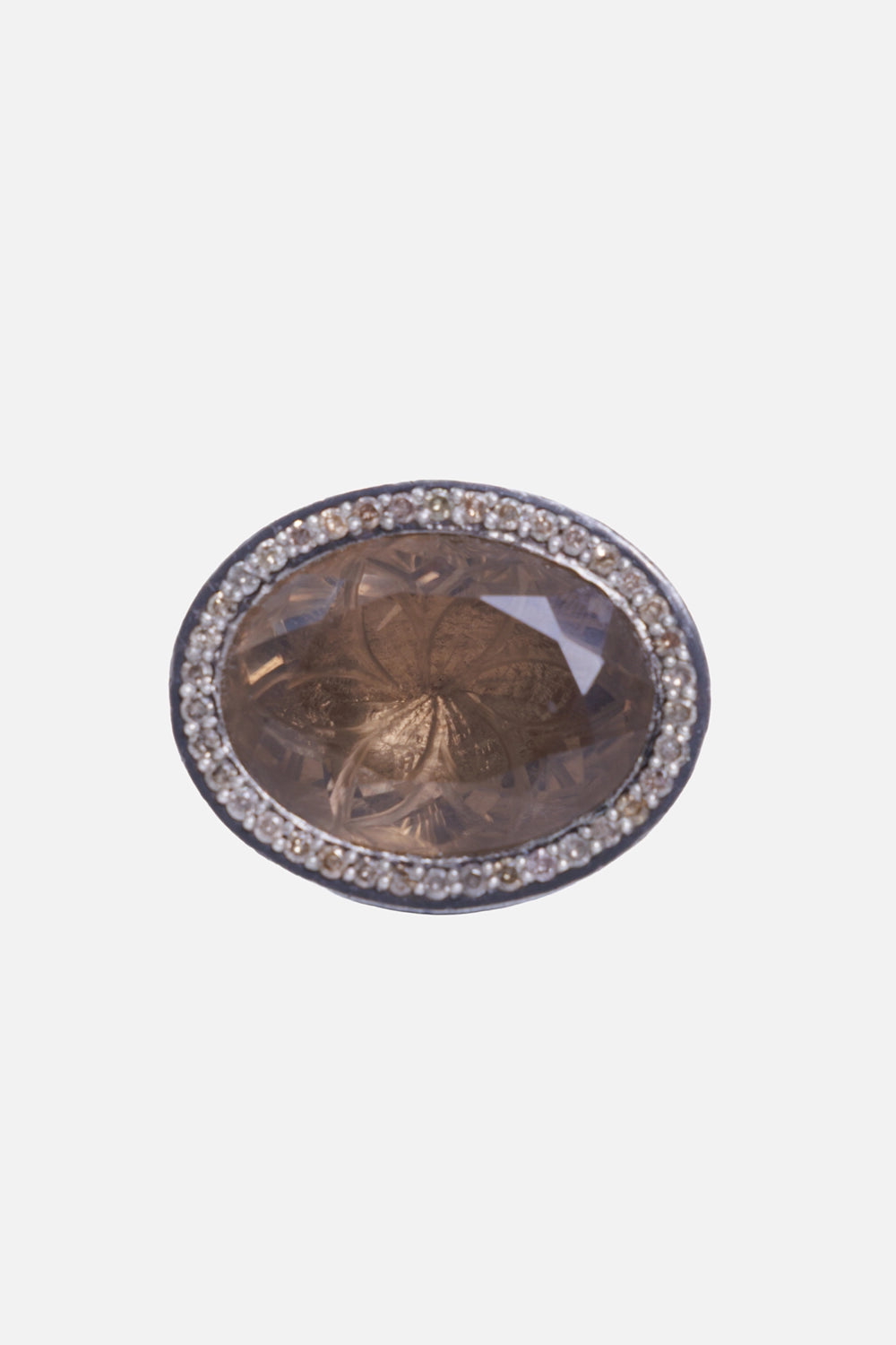 Kundo unisex cocktail ring in smoky brown, front view with an oval faceted stone and clear halo