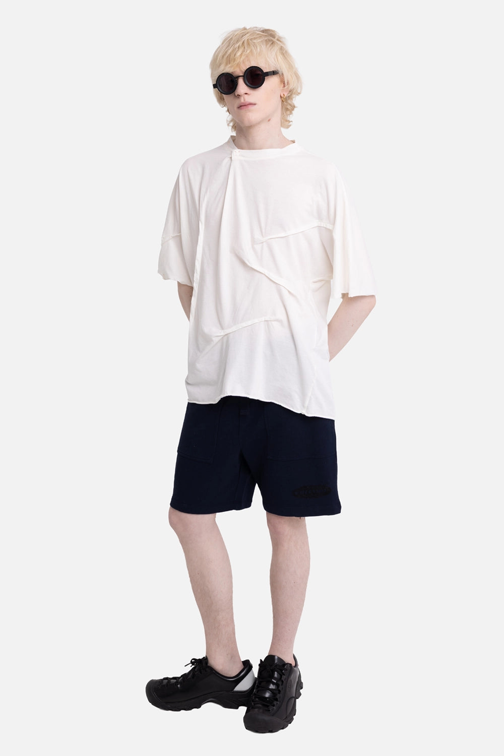 Zadig&Voltaire men's cotton fleece shorts in ink, on-model full-length, black badge near hem