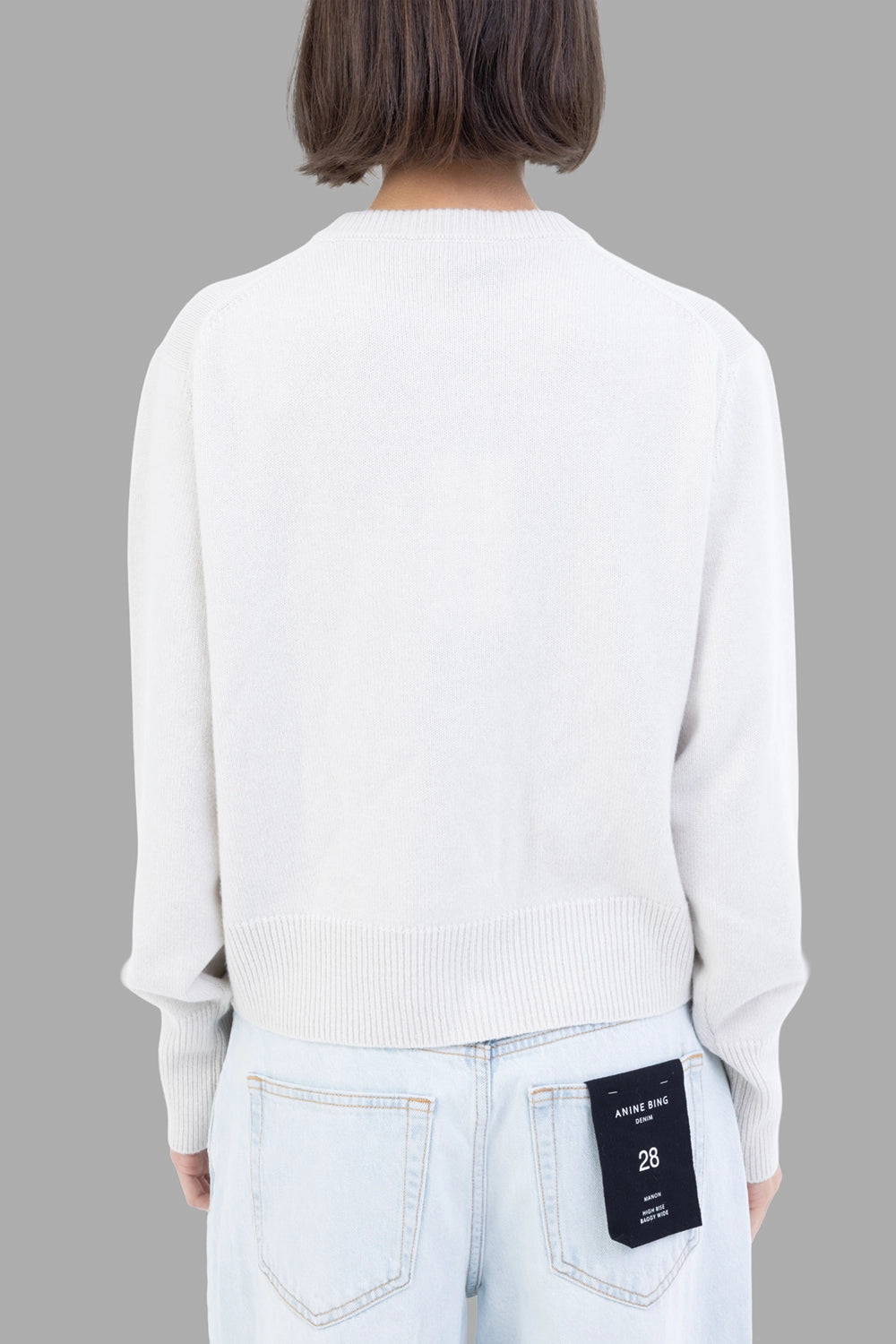 Gentry Portofino women crew-neck cardigan in Stucco, back view, clean finish with wide ribbed hem
