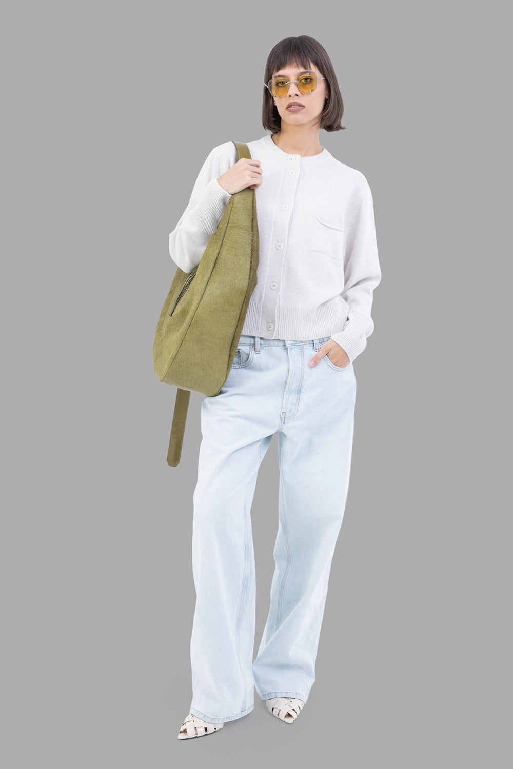 Gentry Portofino women crew-neck cardigan in Stucco, front view, tonal buttons, ribbed cuffs and hem, chest pocket