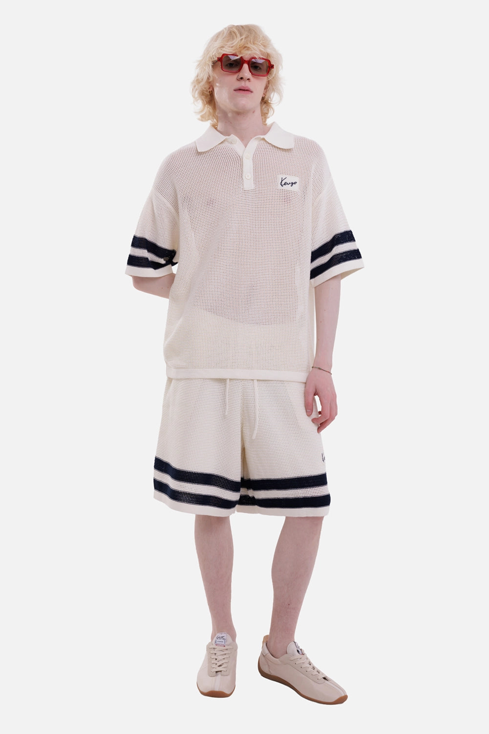 KENZO men's crochet shorts in Off White, full-length model view with striped hems and matching mesh polo