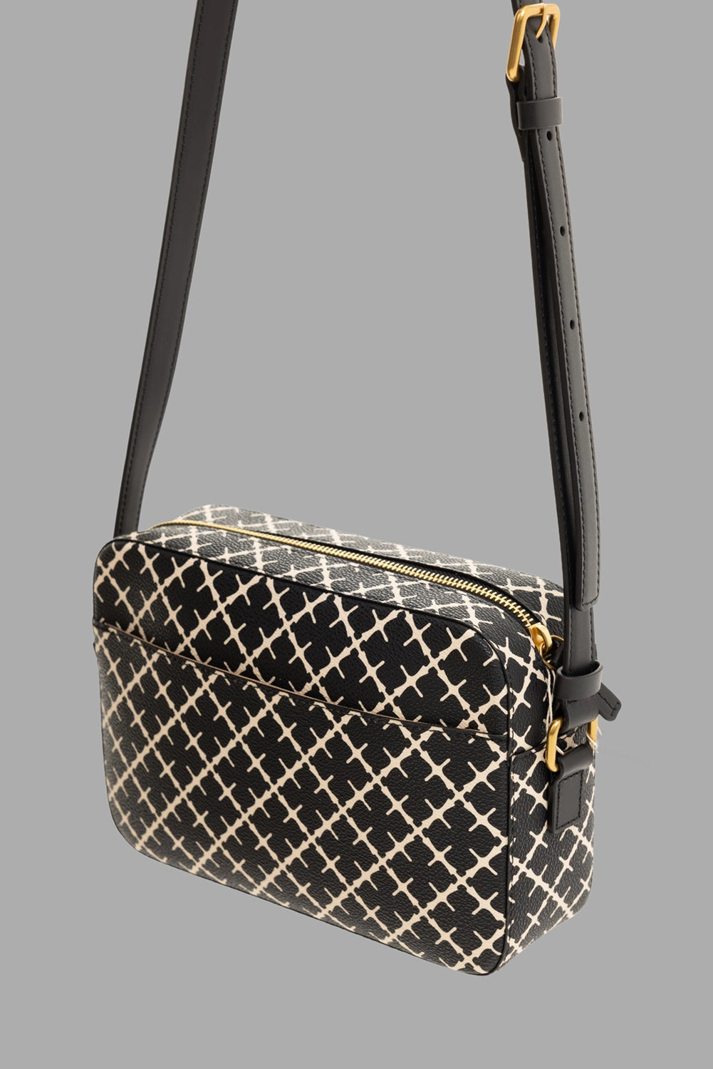 By Malene Birger women's crossbody bag in black, back view, exterior slip pocket and gold hardware