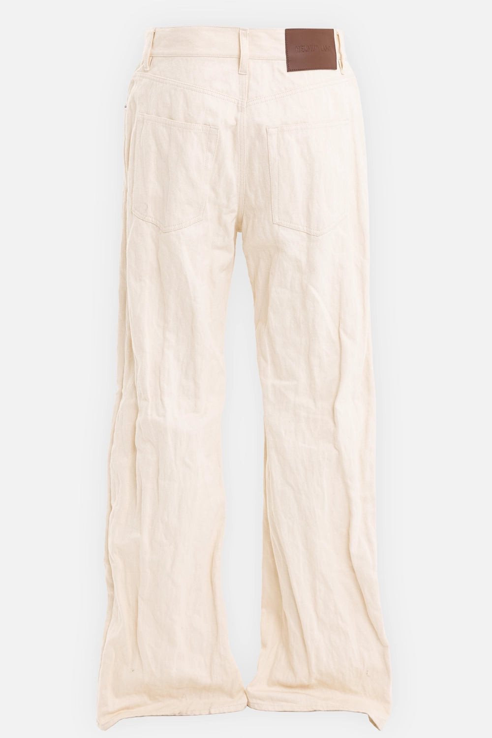 Helmut Lang women's bootcut jeans in Almond, back view with brown logo patch and rear patch pockets