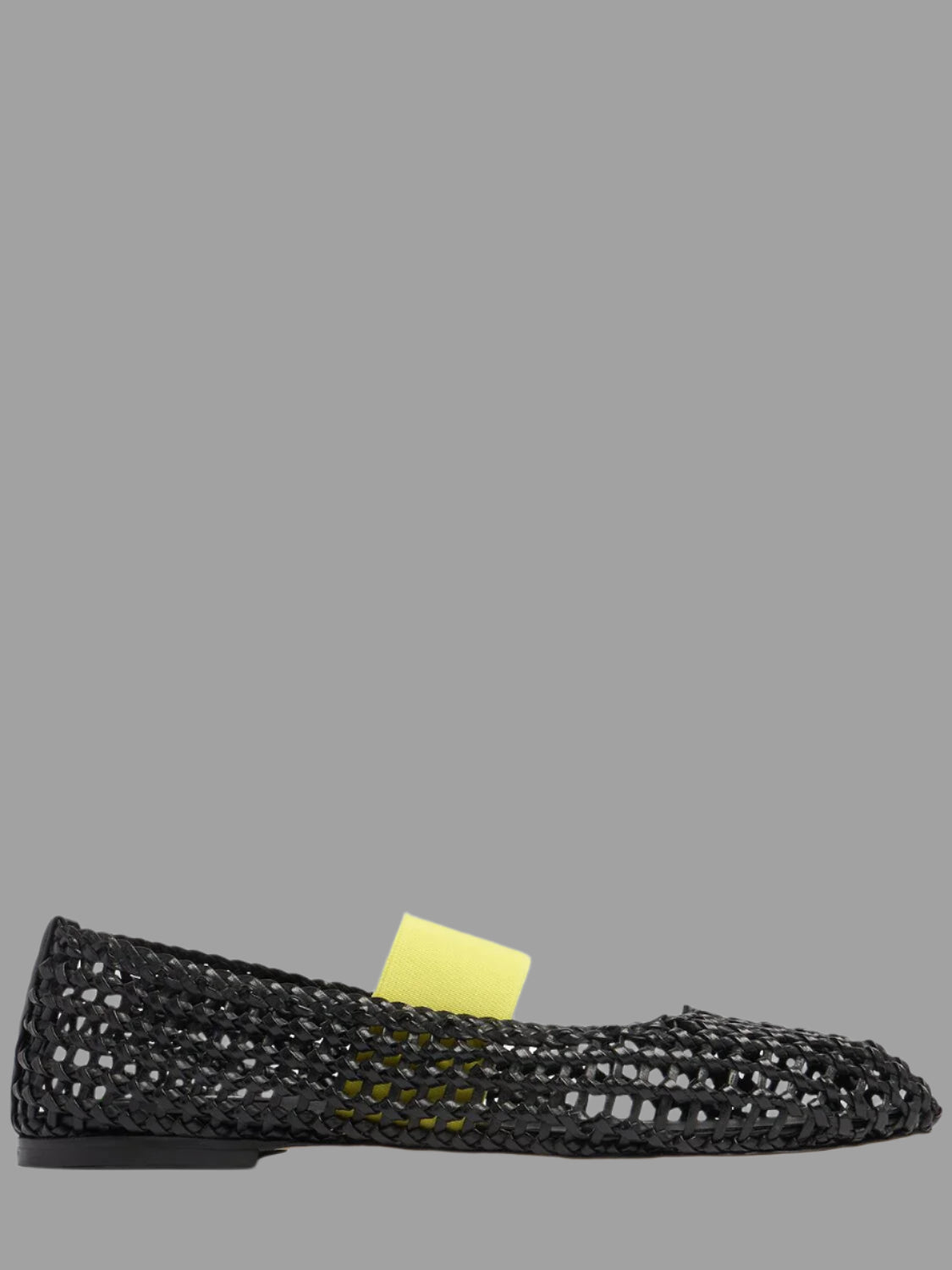 MSGM Leather Mesh Ballerinas side view showing black woven upper with contrasting yellow elastic strap.