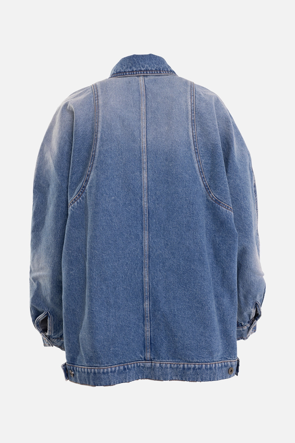 Torishéju women's denim jacket in blue, back view, centre seam and arched stitched panels