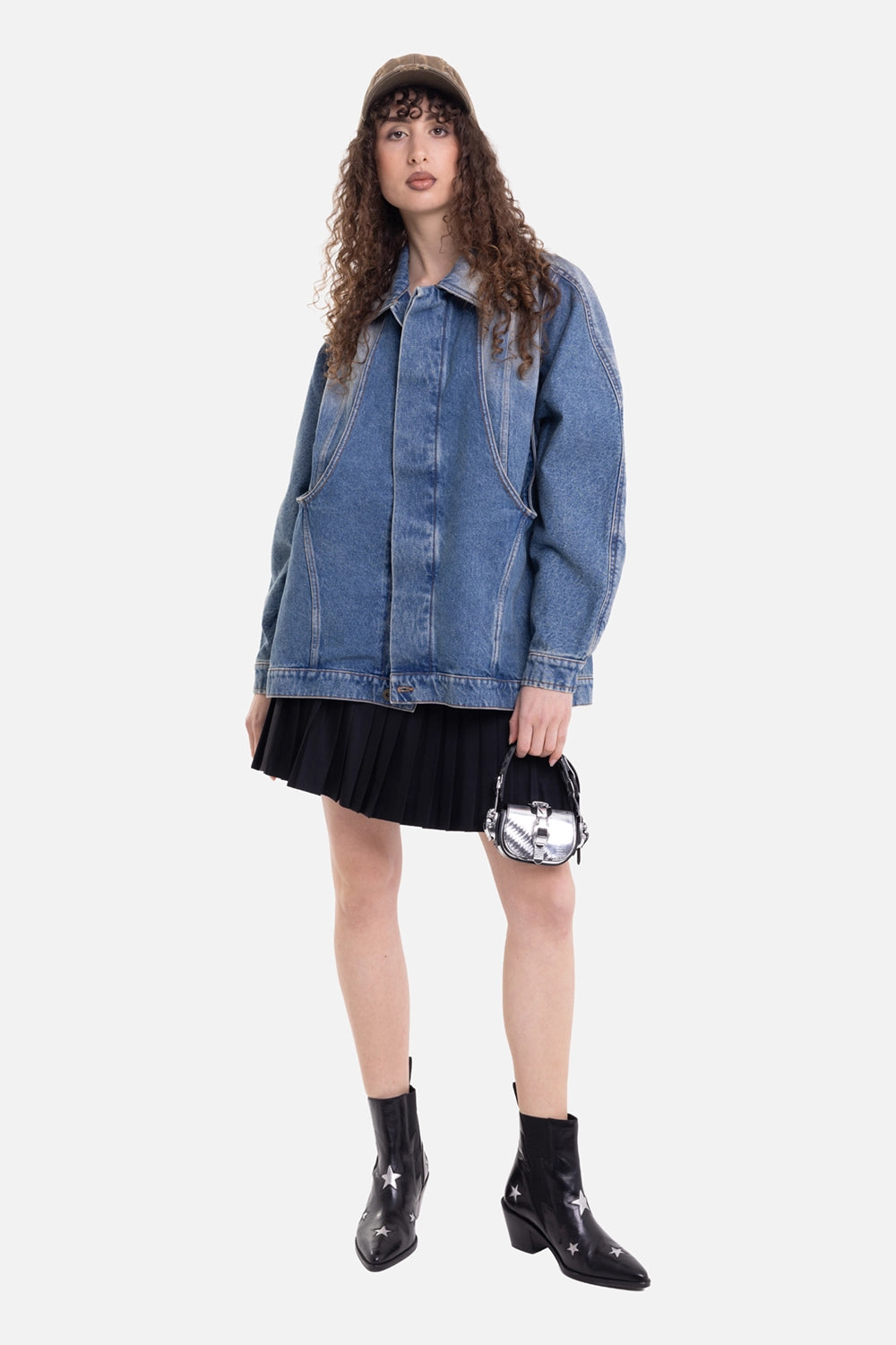 Torishéju women's denim jacket in blue, on-model full-length view, oversized fit with curved seam panels
