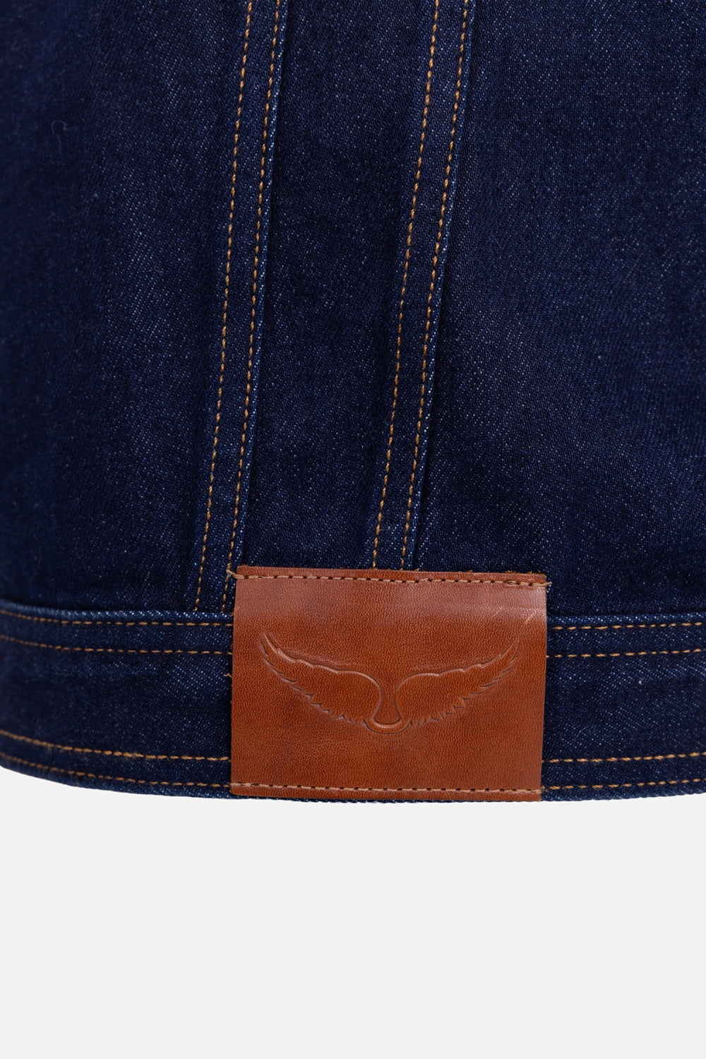 Zadig&Voltaire women’s denim jacket in brut, hardware close-up, leather wing patch with embossed logo.