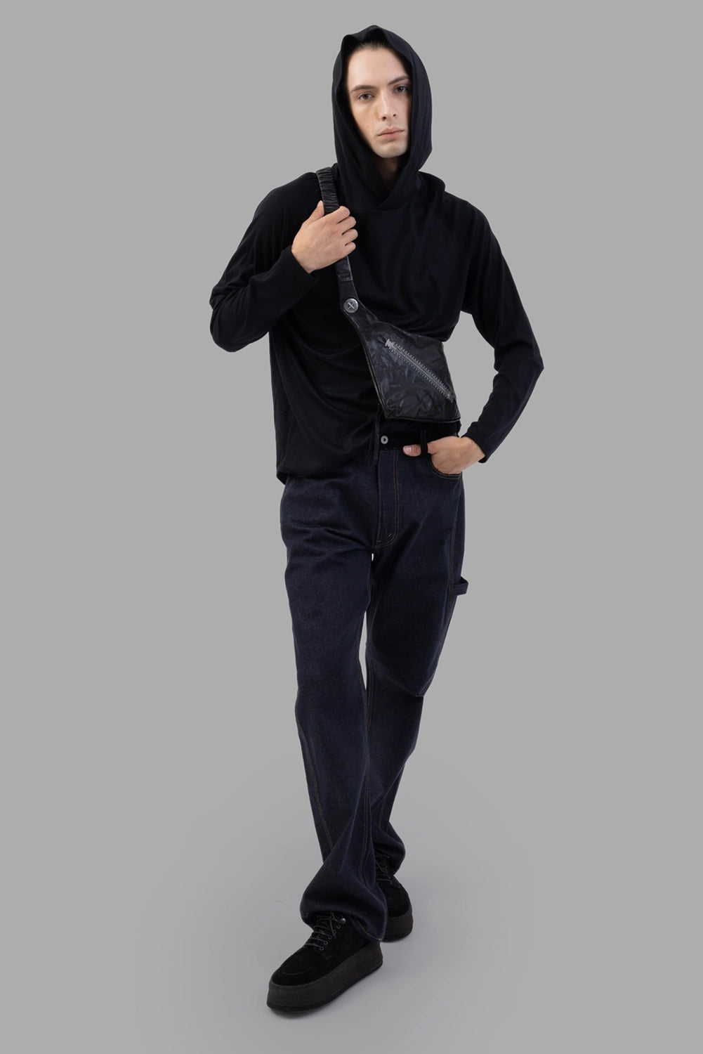 Junya Watanabe denim trousers in indigo, full-length on model, straight leg