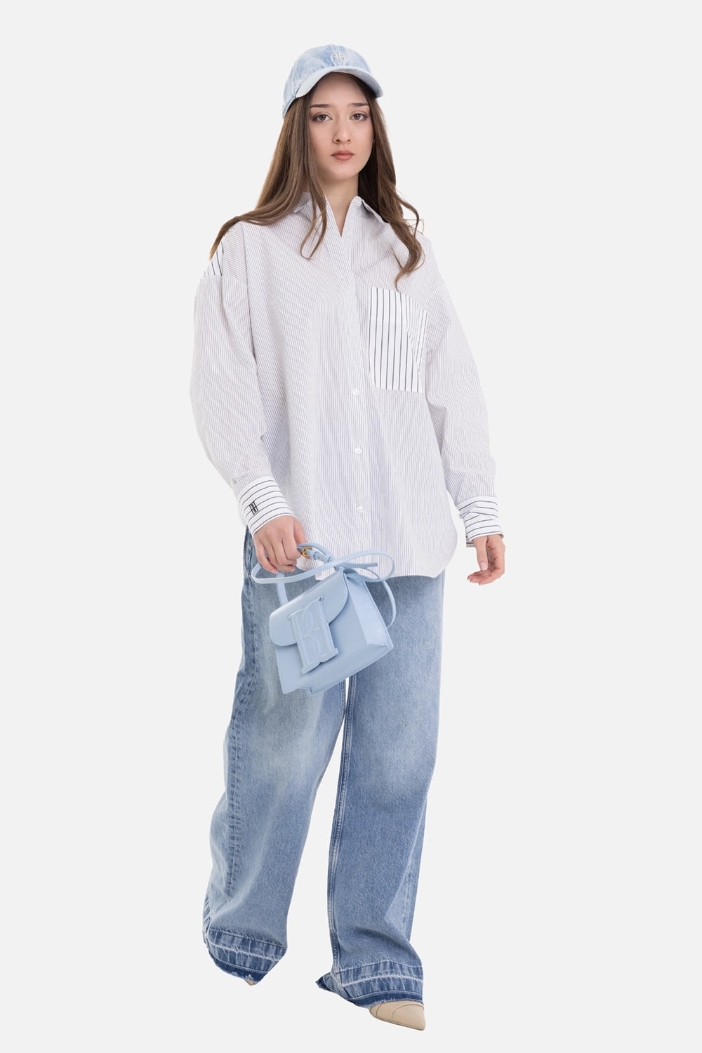 By Malene Birger women's striped cotton shirt in black and white, on-model full length with dropped shoulders