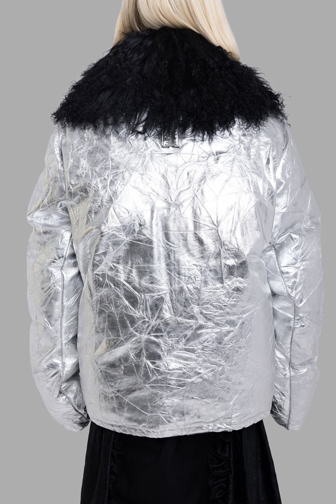 Isaac Sellam unisex metallic silver down jacket, back view, crinkled metallic shell with oversized shearling collar.