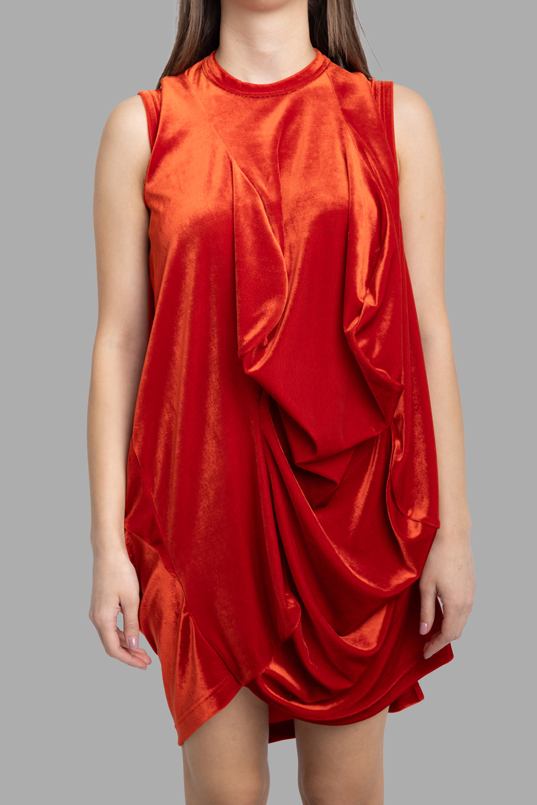 Comme des Garçons women's draped mini dress in red, front view, sleeveless crew neck with sculptural gathered panels.