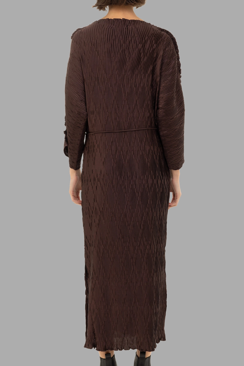 By Malene Birger women pleated maxi dress in Coffee Brown, back view, slim belt and side-slit detail.