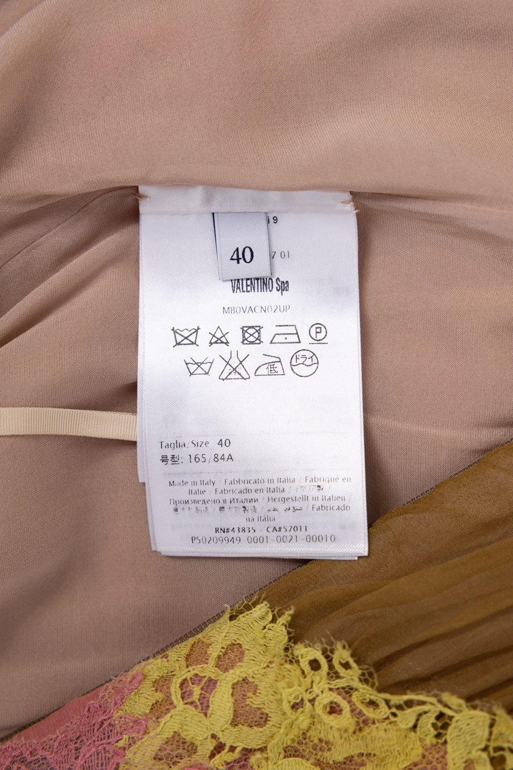 Pre-owned Valentino dress in multicolour, label close-up, size 40 care tag