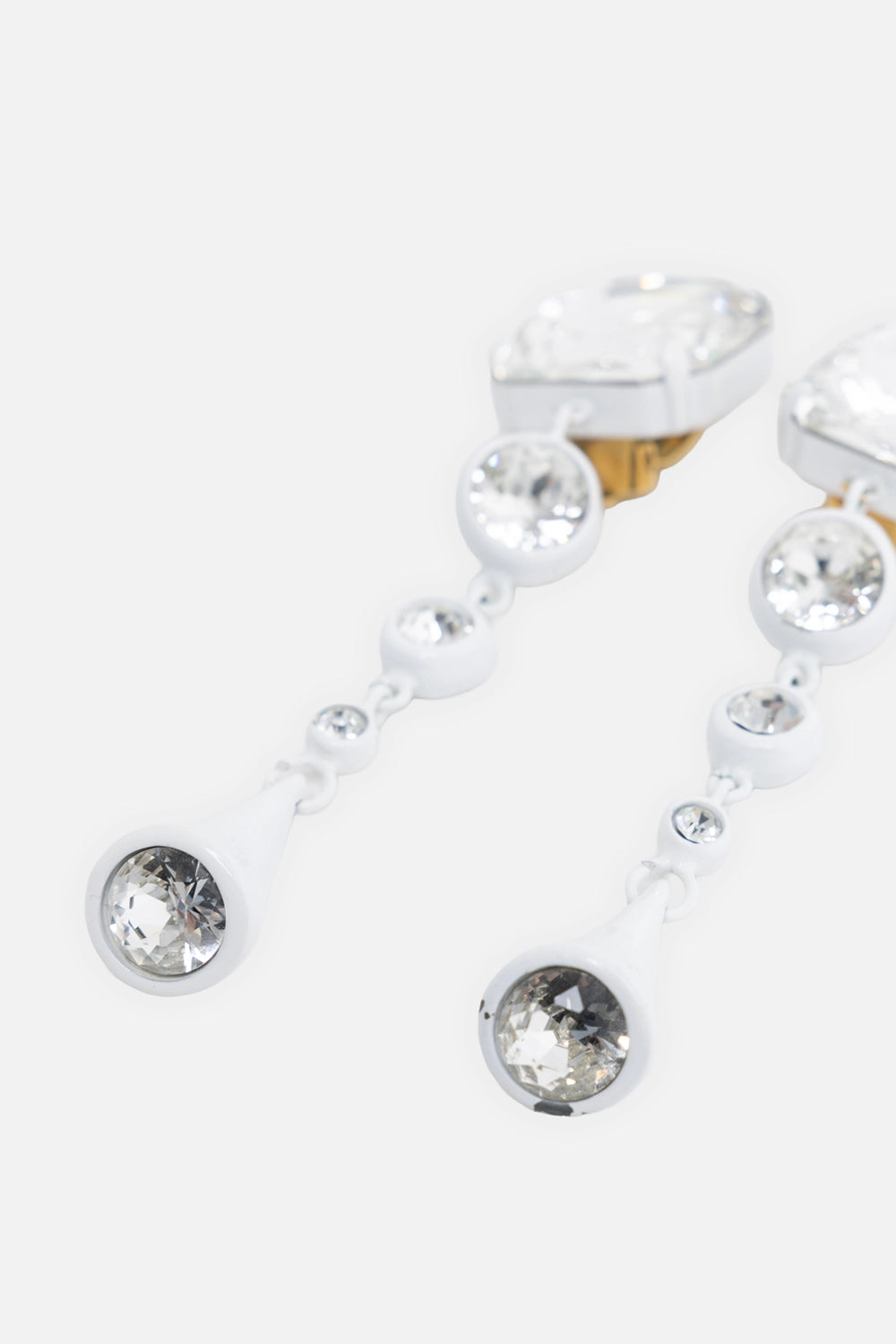 Pre-owned Marni women's drop earrings in white, detail view, graduated crystal links and cone drops with inset stones.