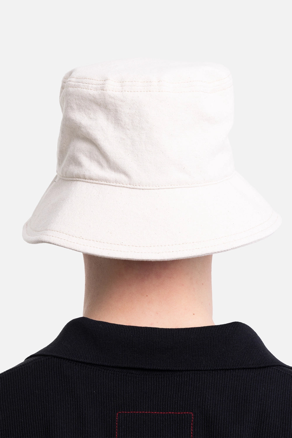 Vivienne Westwood unisex bucket hat in natural, back view, stitched brim and clean canvas crown