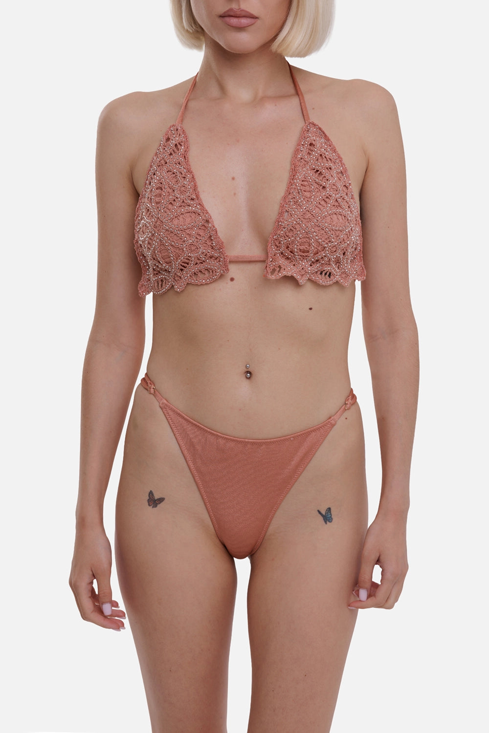 Anjuna women's bikini in blush pink, on-model half-length view, scalloped embroidered cups and slim ties