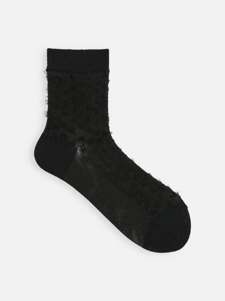 Tabio. Fringe Style Low Crew Socks in black, featuring a unique tousled texture from glitter knit.