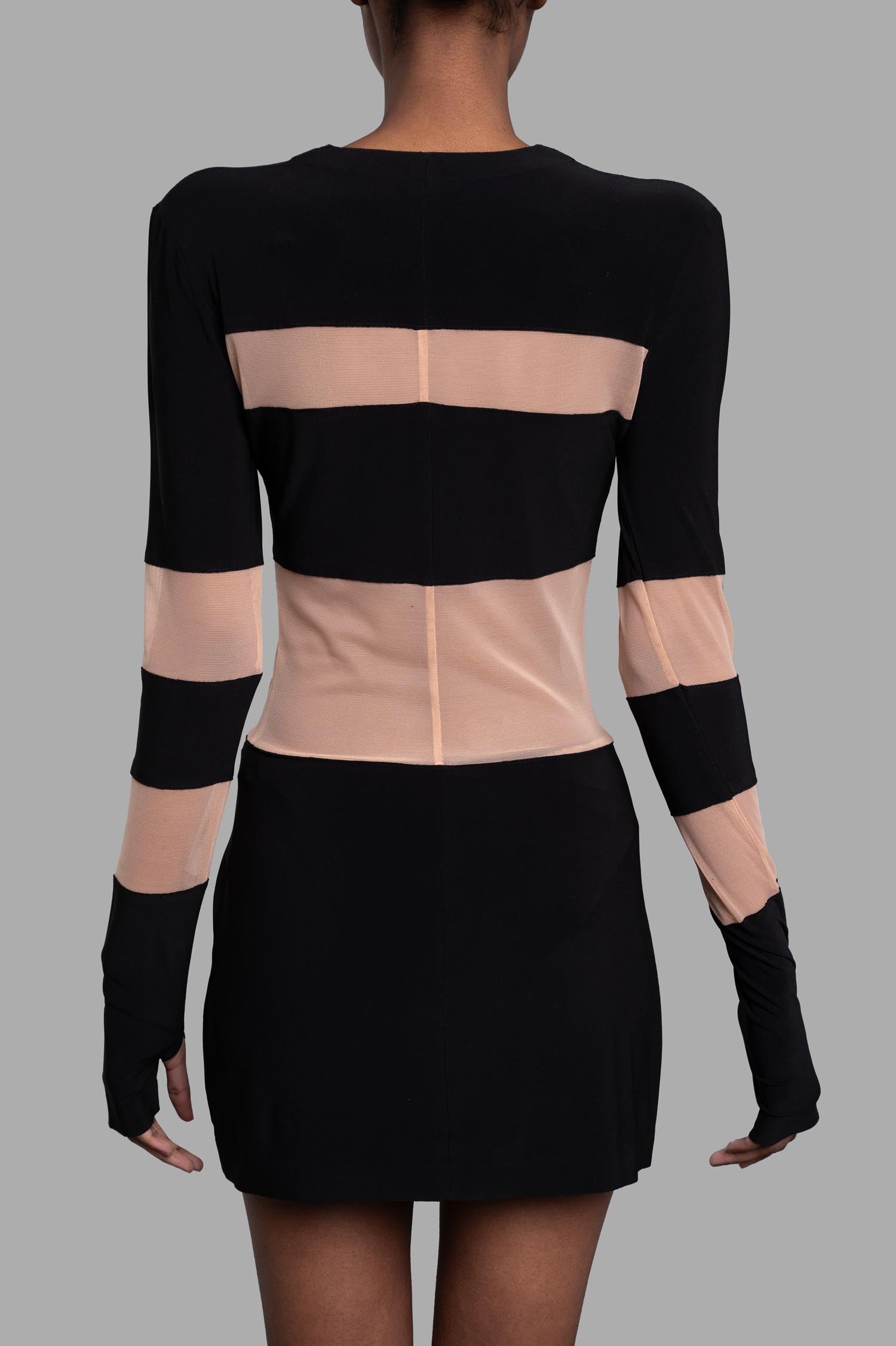 Norma Kamali Spliced Pickleball Dress, back view featuring sporty black and nude stripes, long sleeves, and thumbholes.