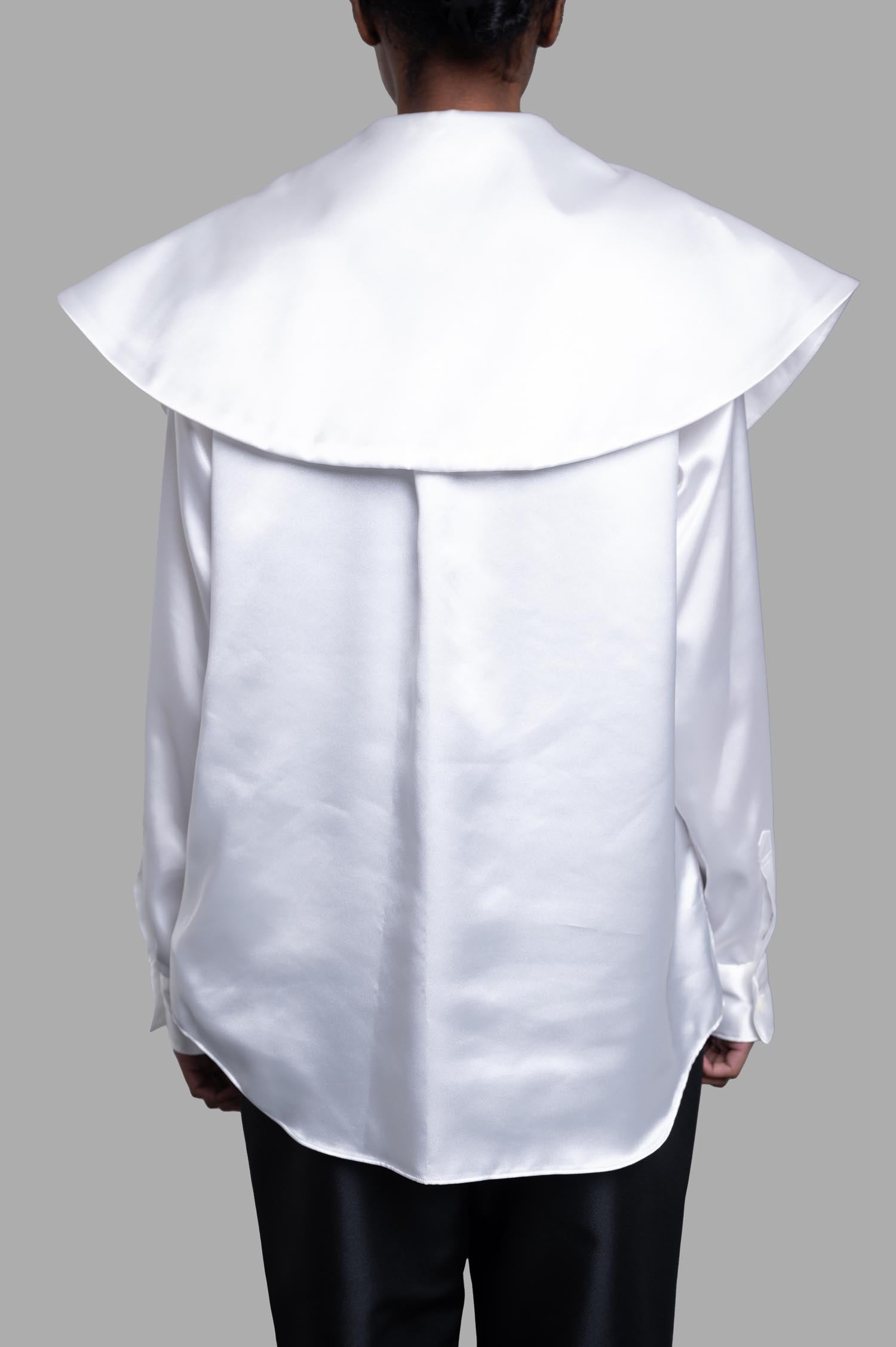 Comme des Garçons Oversized-collar Shirt, shown from the back in sleek white satin with a bold collar and buttoned cuffs.