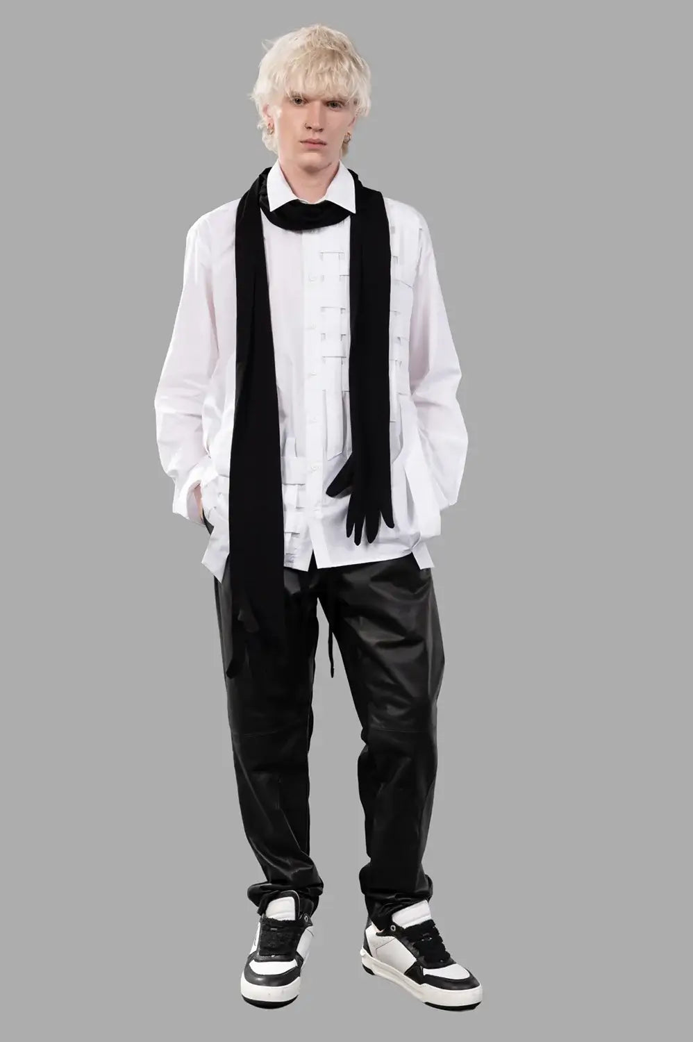 Full-length view of white long-sleeve shirt with woven panel detail at front, relaxed fit