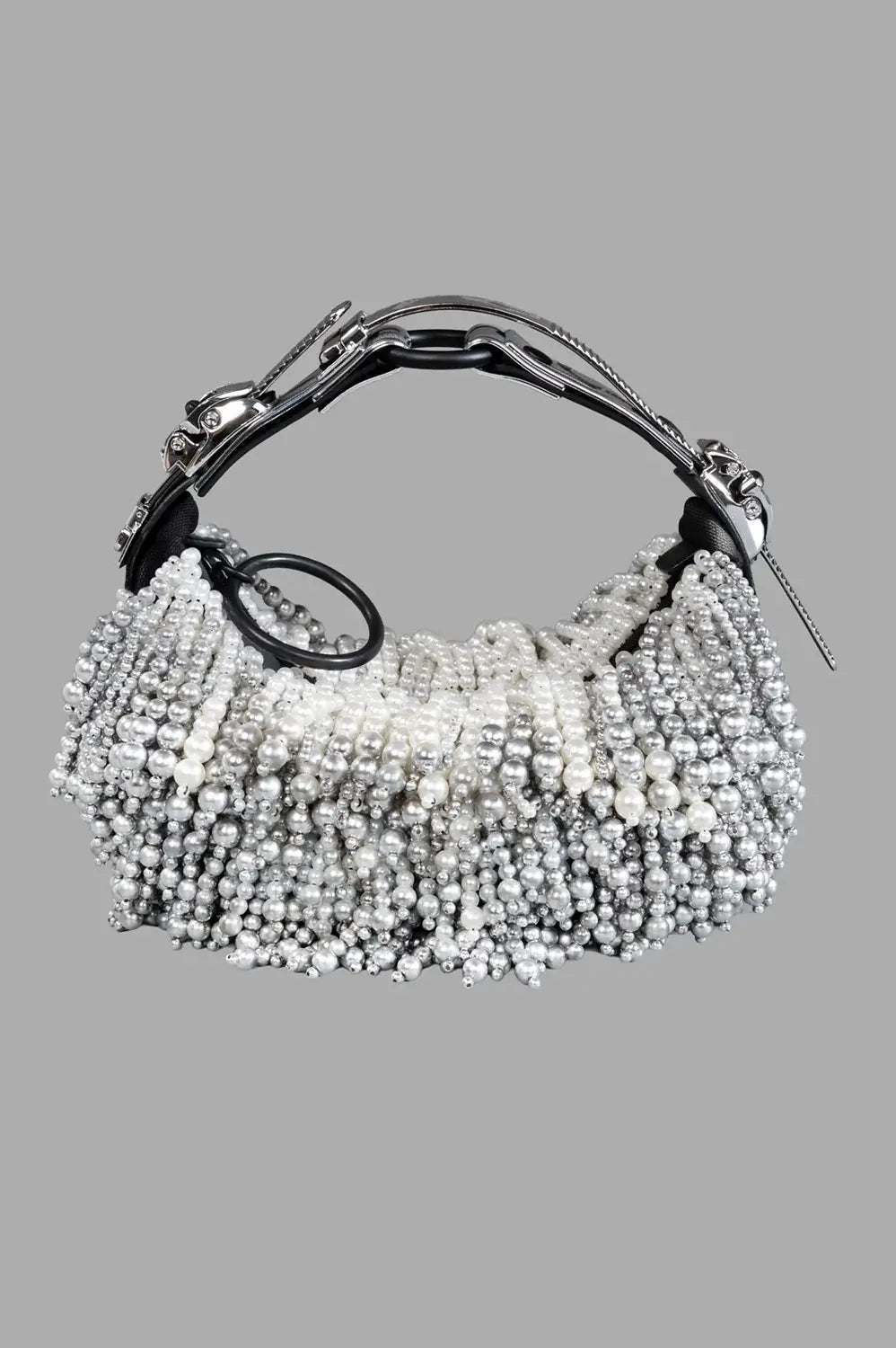 Full view of pearl-beaded half-moon shoulder bag with gradient silver beading, structured handle, and zip closure.