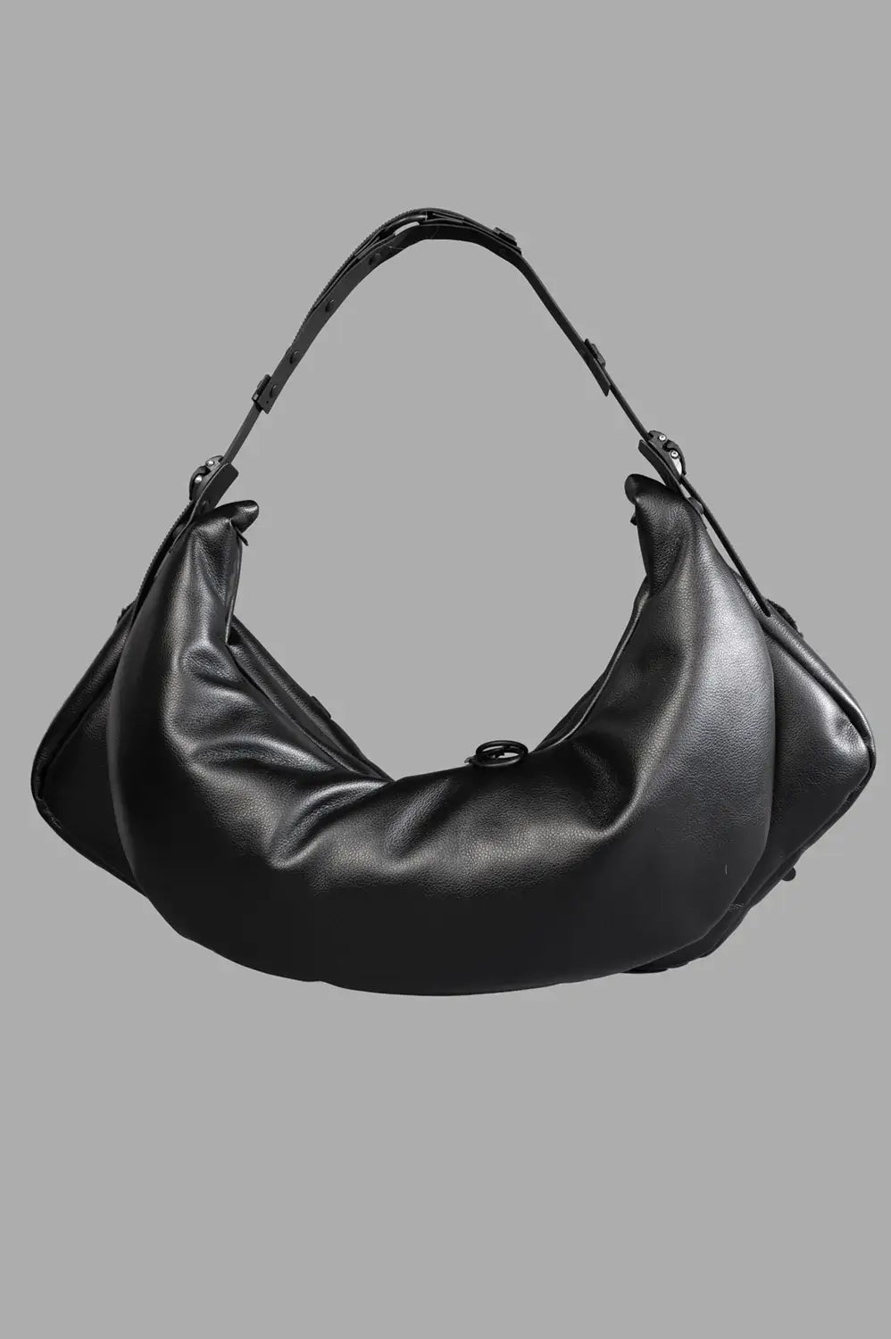 Back detail showing padded panel, adjustable handle components, and side strap hardware.