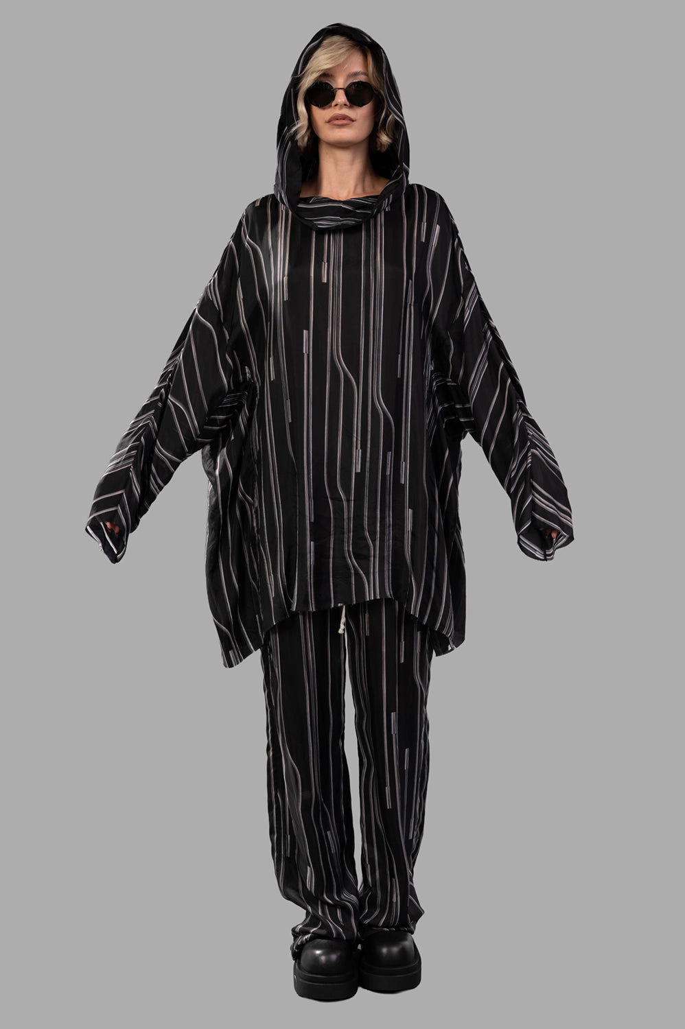Rick Owens hooded tunic in Black/Pearl, on-model full length, draped hood and striped print