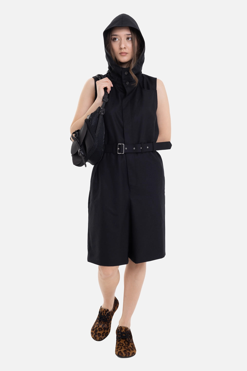 Noir Kei Ninomiya women's jumpsuit in Black, on-model full-length view with belted waist and knee-length leg