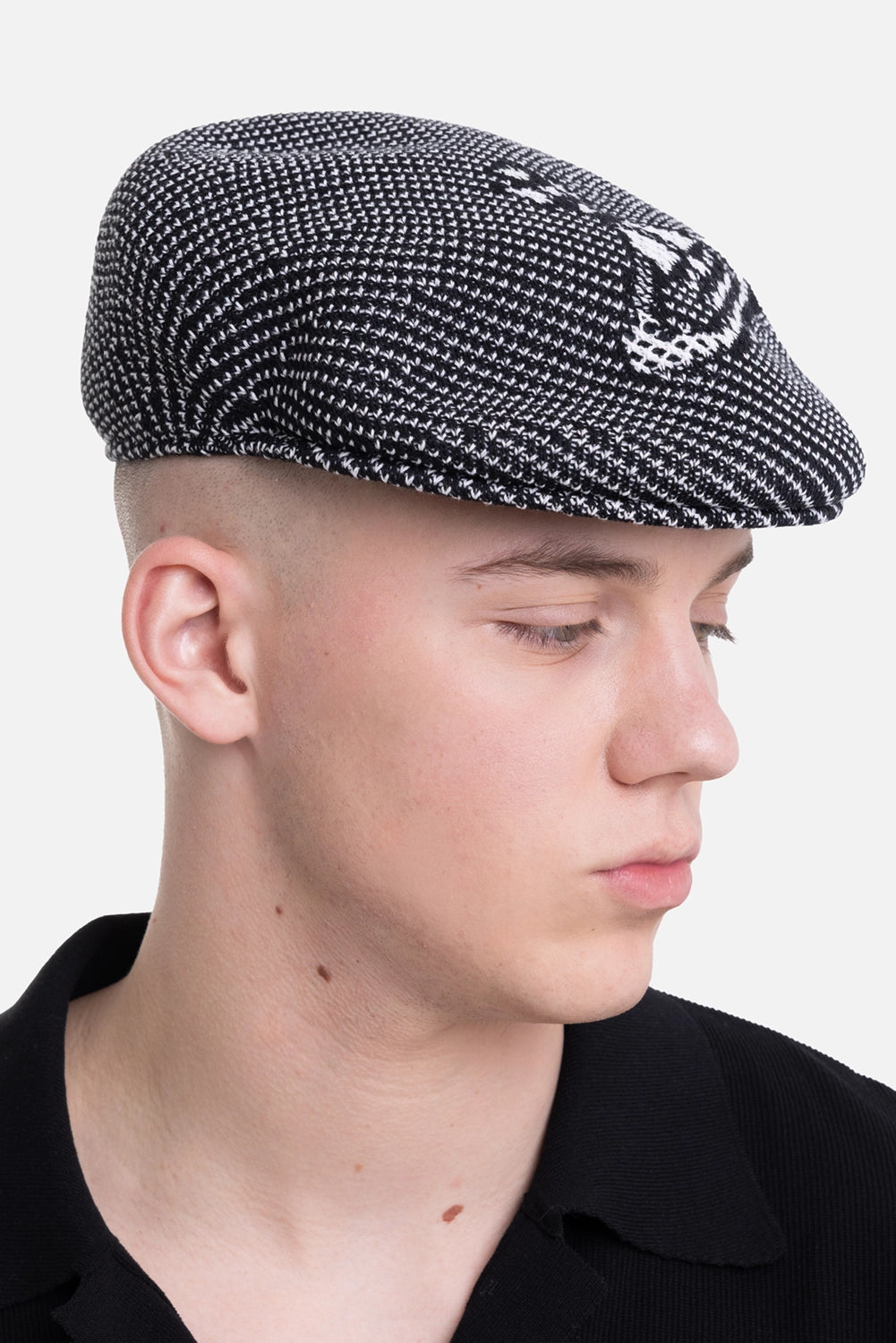 Vivienne Westwood unisex hunting beret in black, side view, white Orb motif on crown