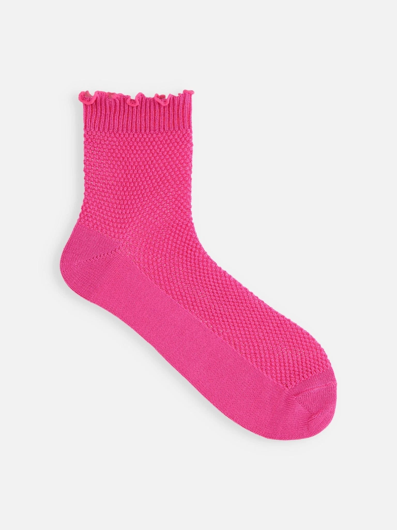 Tabio Merrow Top Mesh Low Crew Socks in vibrant fuchsia with a trendy mesh knit and ruffled top for sporty style.