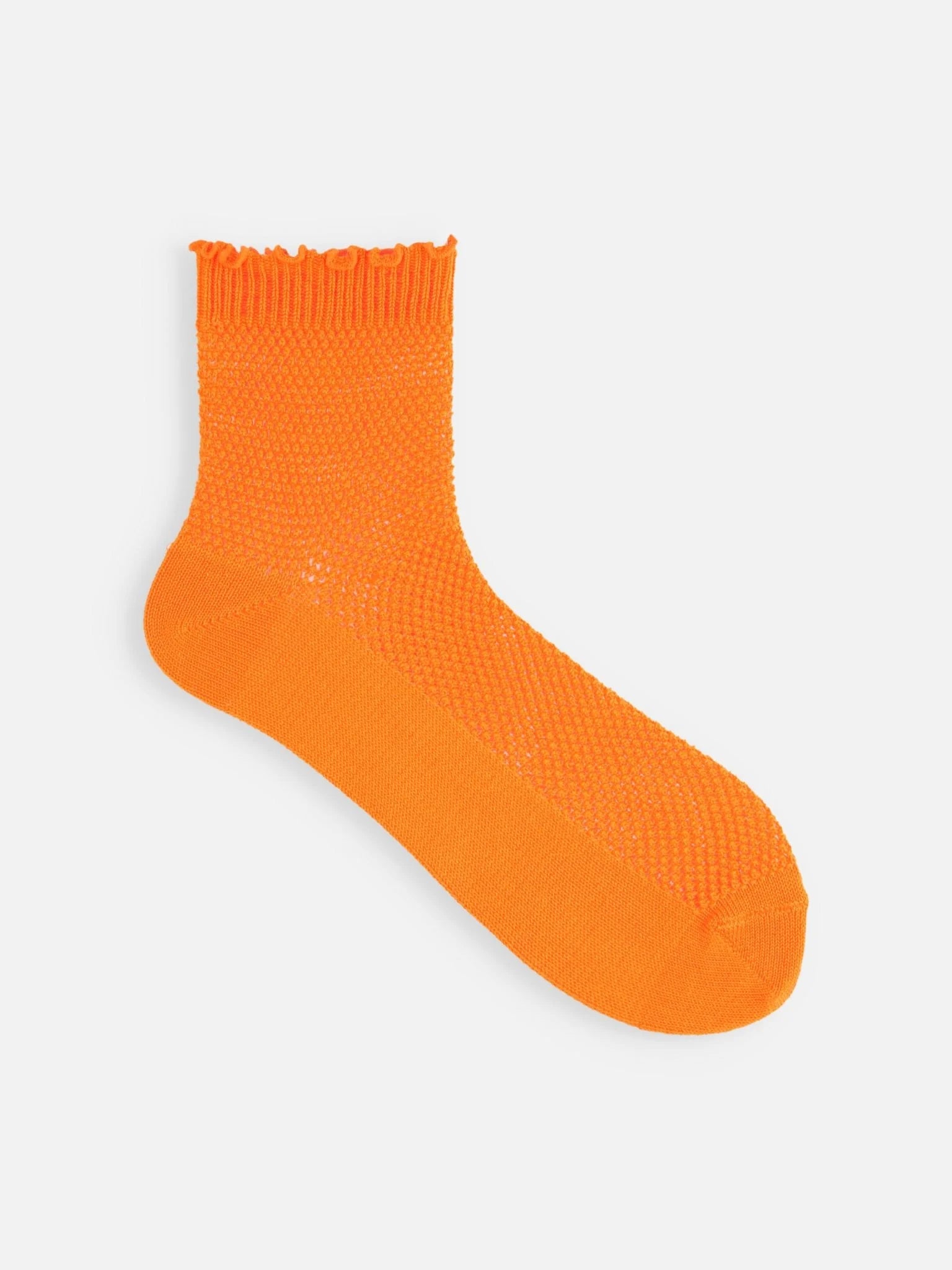 Tabio Merrow Top Mesh Low Crew Socks in vibrant orange, featuring a trendy knitted mesh pattern and ruffled cuff design.