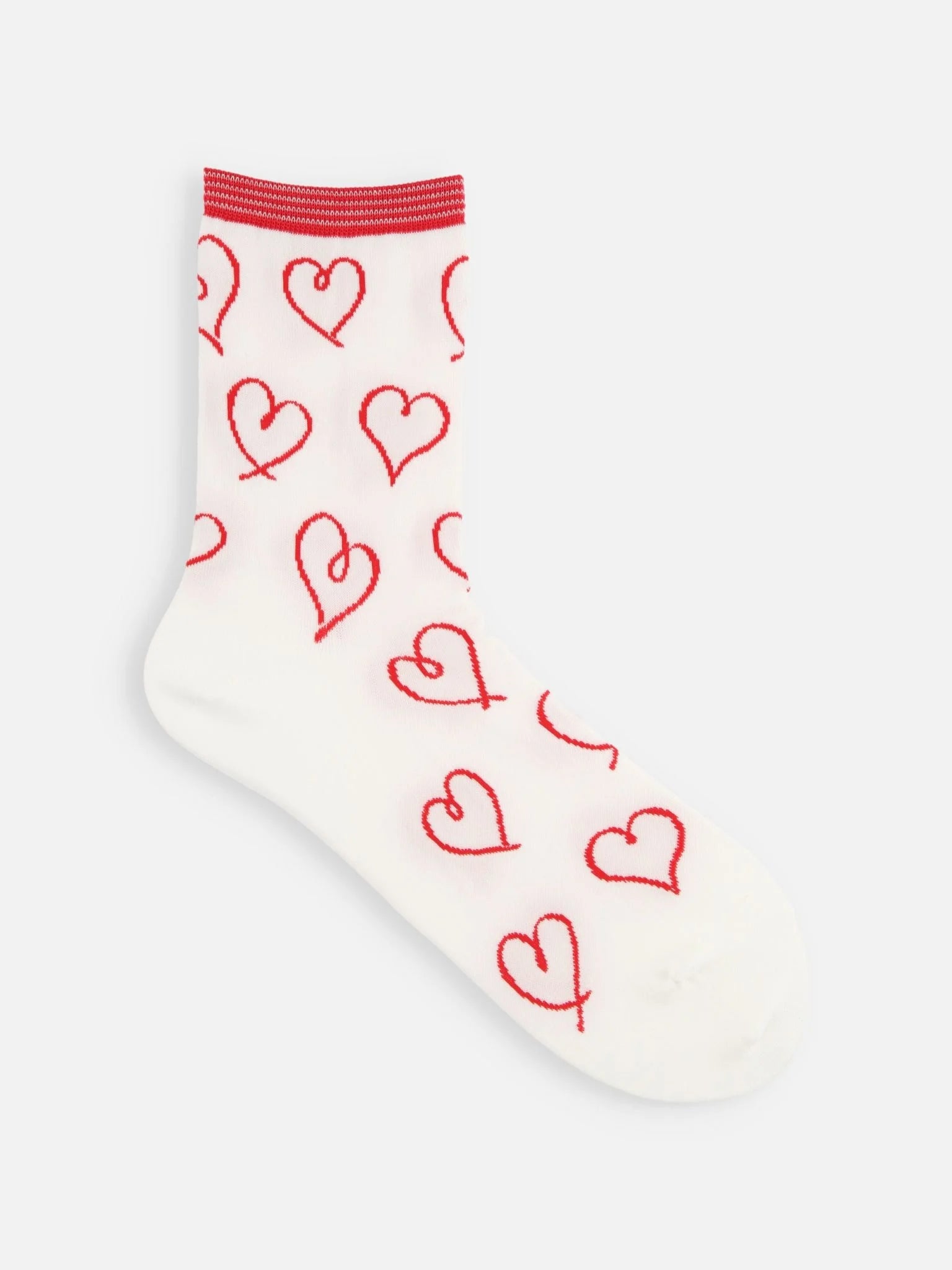 Tabio Heart Drawing Low Crew Socks featuring red heart pattern on white, side view. Perfect for casual sneakers.