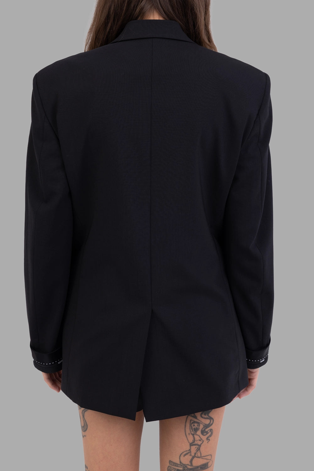 MSGM women's jacket in black, back view, center vent and satin-ribbon cuffs