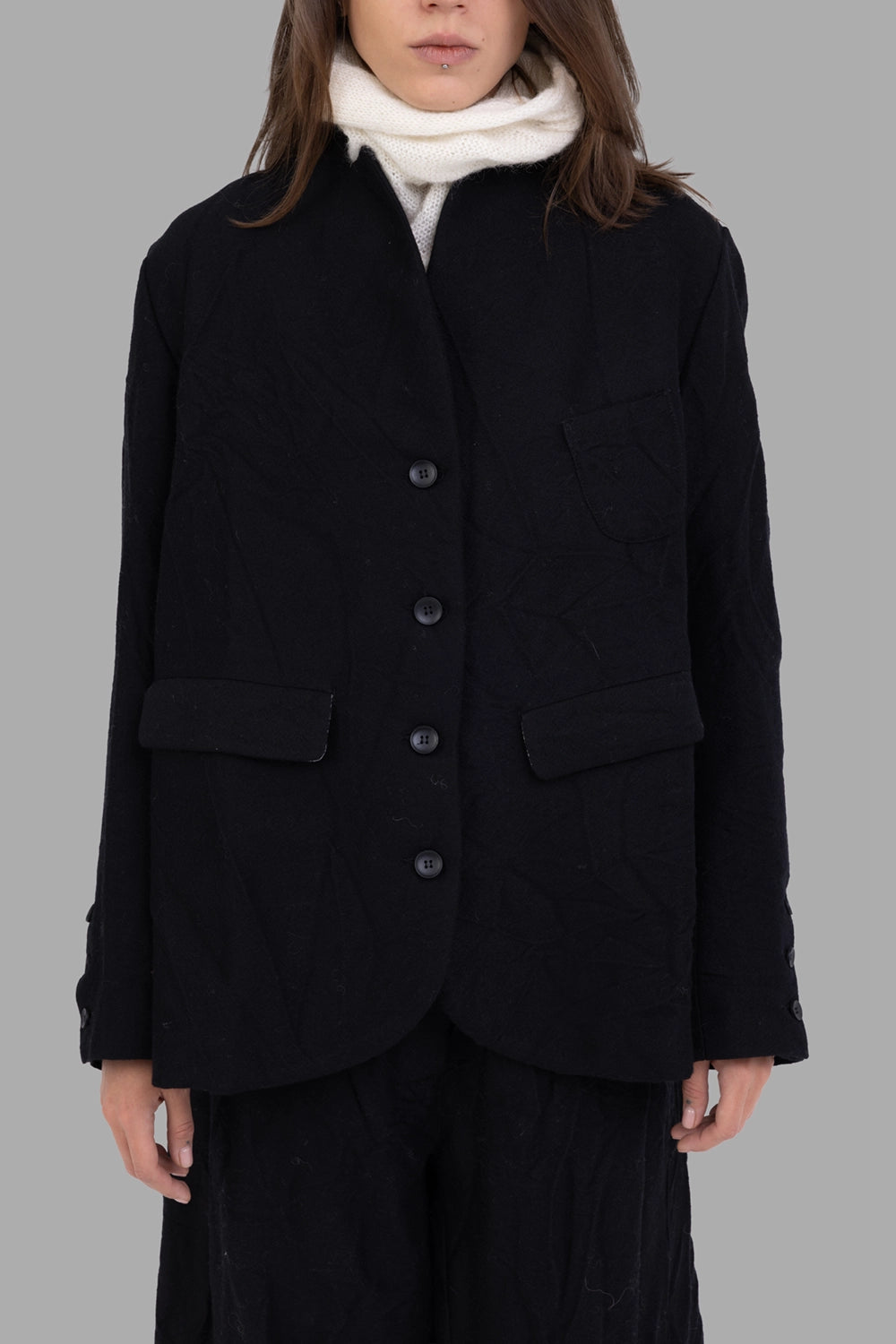 Marc Point women’s black jacket, front view, stand collar, chest pocket, five buttons, crinkled wool texture.