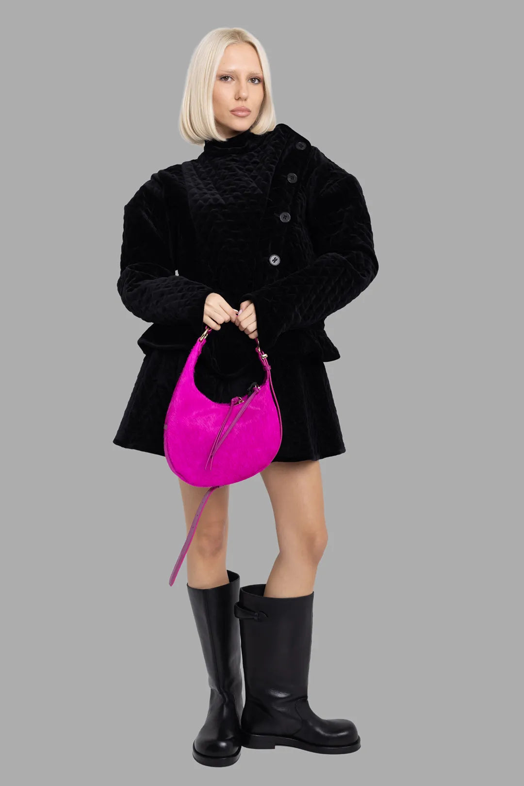 Vivienne Westwood women's black fencing jacket, on-model full-length view, quilted cotton velvet with flared peplum hem.