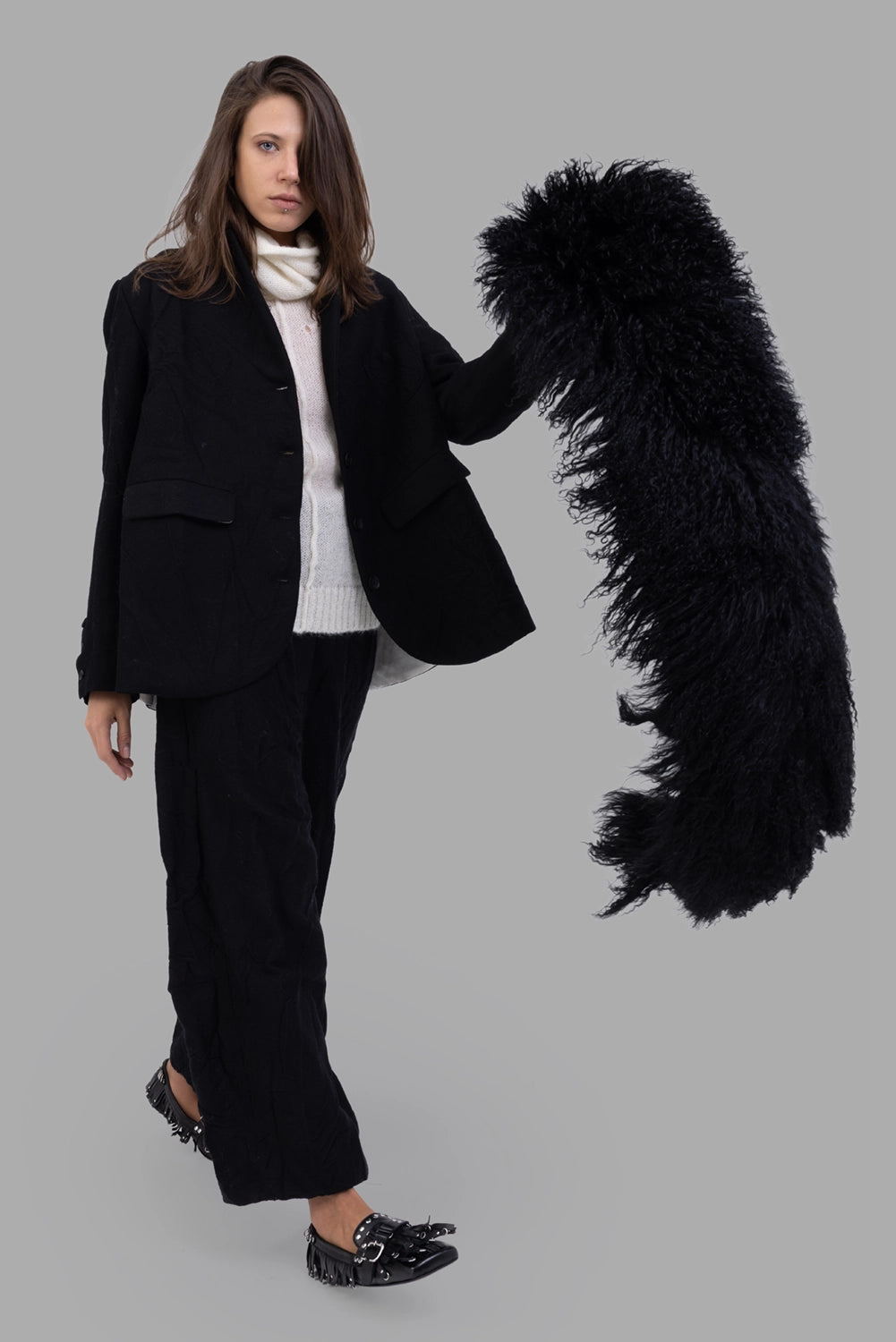 Marc Point women’s jacket in black, on-model full length, buttoned front, flap pockets, textured wool.