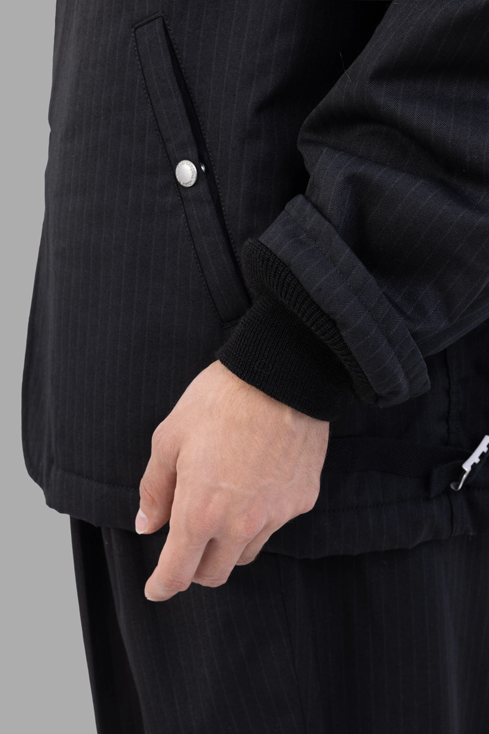 Junya Watanabe jacket in black pinstripe, cuff detail with rib knit and pocket snap