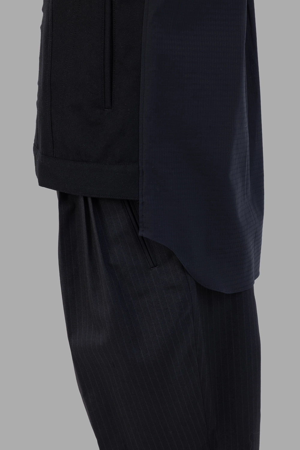 Comme des Garçons jacket-shirt in black, detail view of wool/nylon panel texture