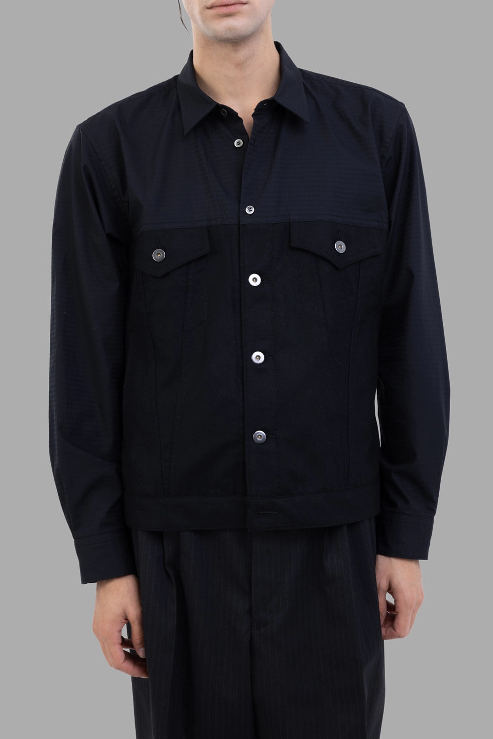 Comme des Garçons jacket-shirt in black, front view, flap chest pockets and button closure