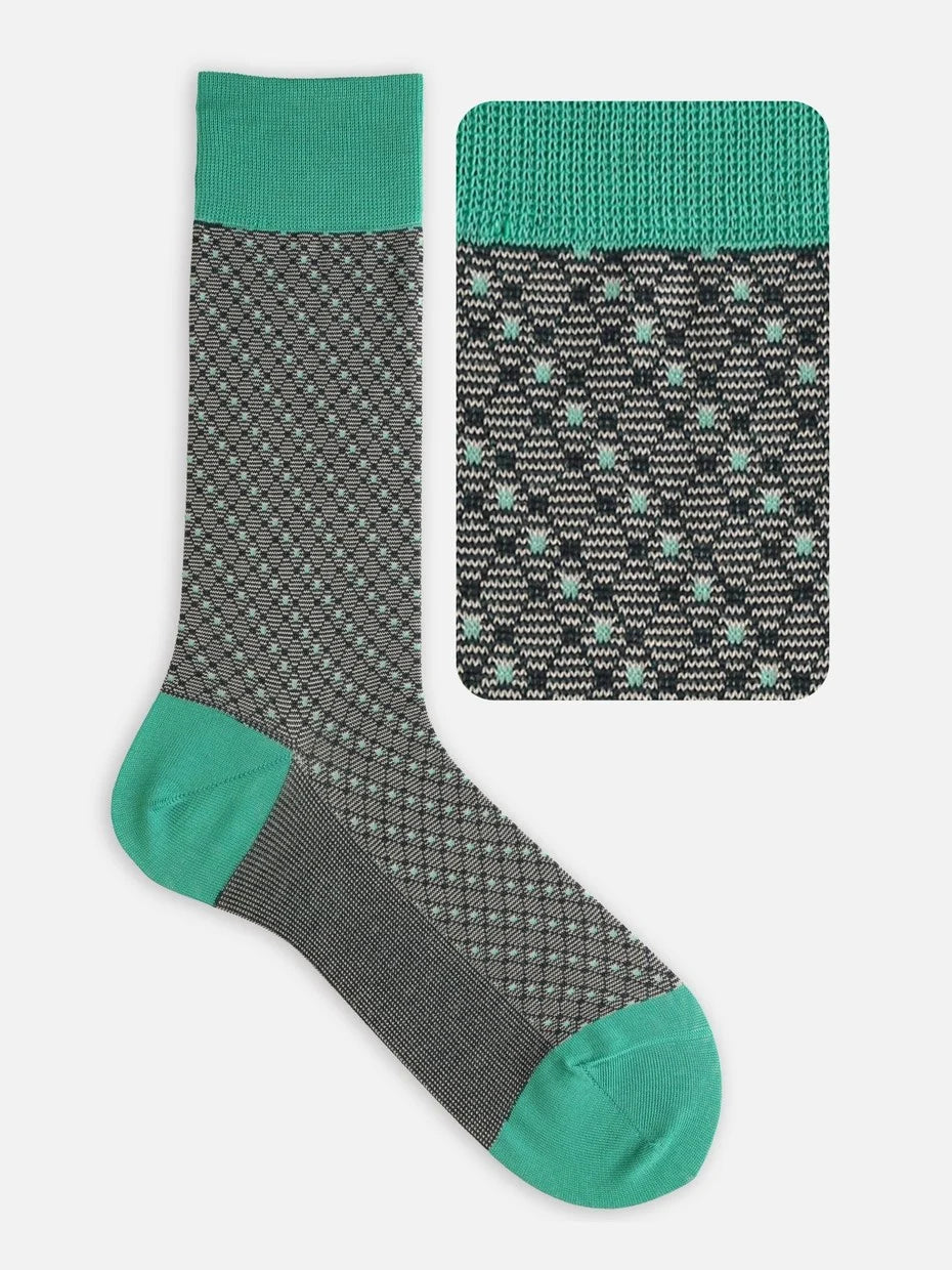 Tabio Jacquard Diamond Rhombus Socks showcase a textured pattern with a stylish dark gray base and vibrant green accents.