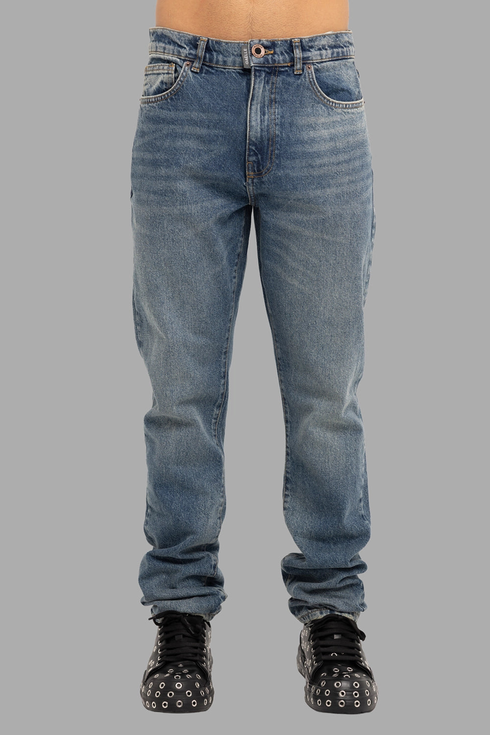 Gaelle Paris men’s jeans in blue, front view, five-pocket with zip fly and button, light whiskering