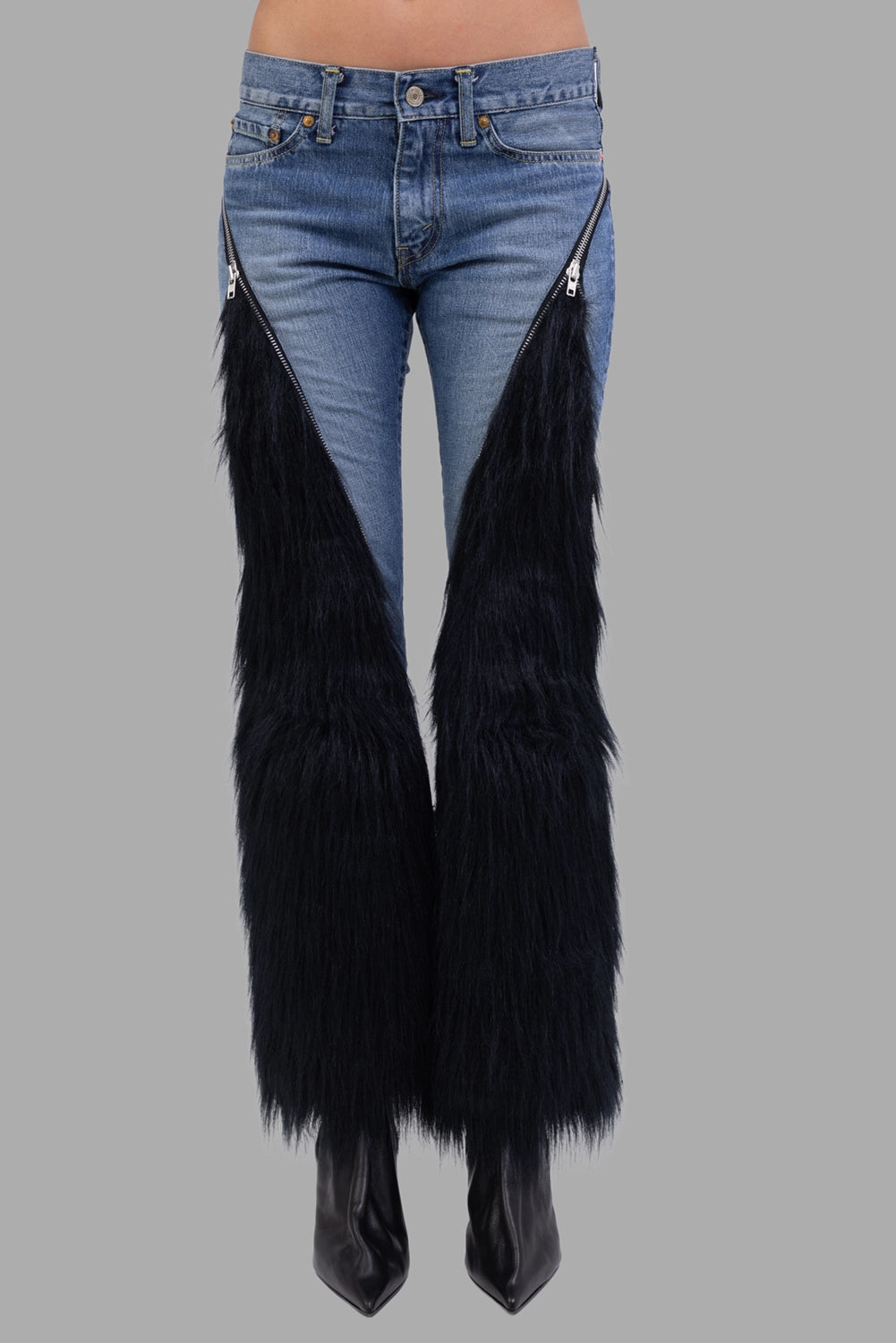 Junya Watanabe x Levi’s women’s jeans in indigo/black, front view, V-shaped silver zips and shaggy faux-fur panels