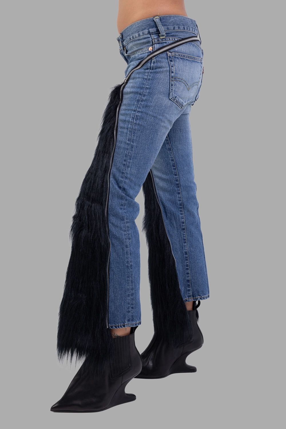 Junya Watanabe x Levi’s women’s jeans in indigo/black, side view, deep fur panel and metal zip along seam