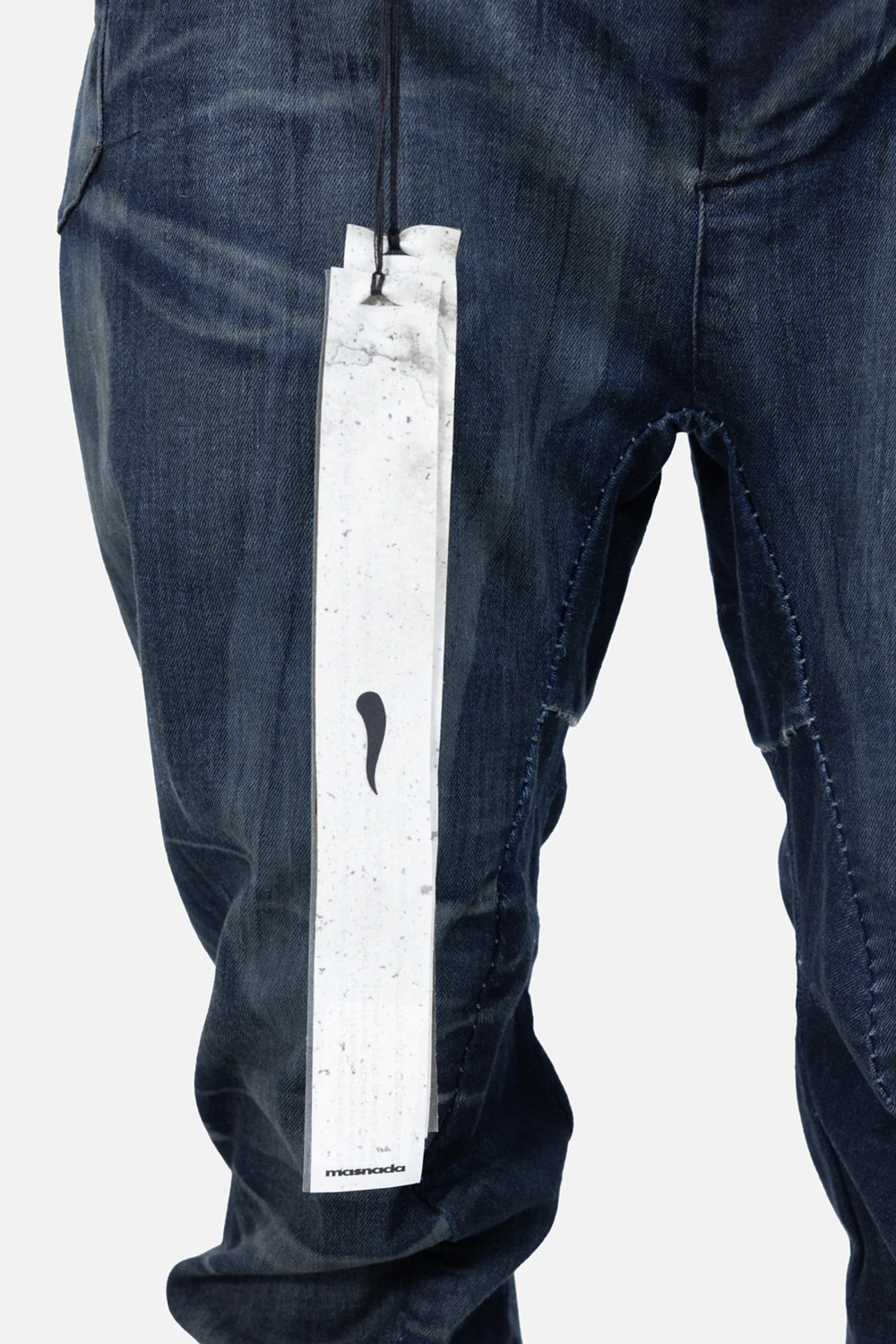 Pre-owned Masnada jeans in indigo, detail view, Masnada hangtag at waistband