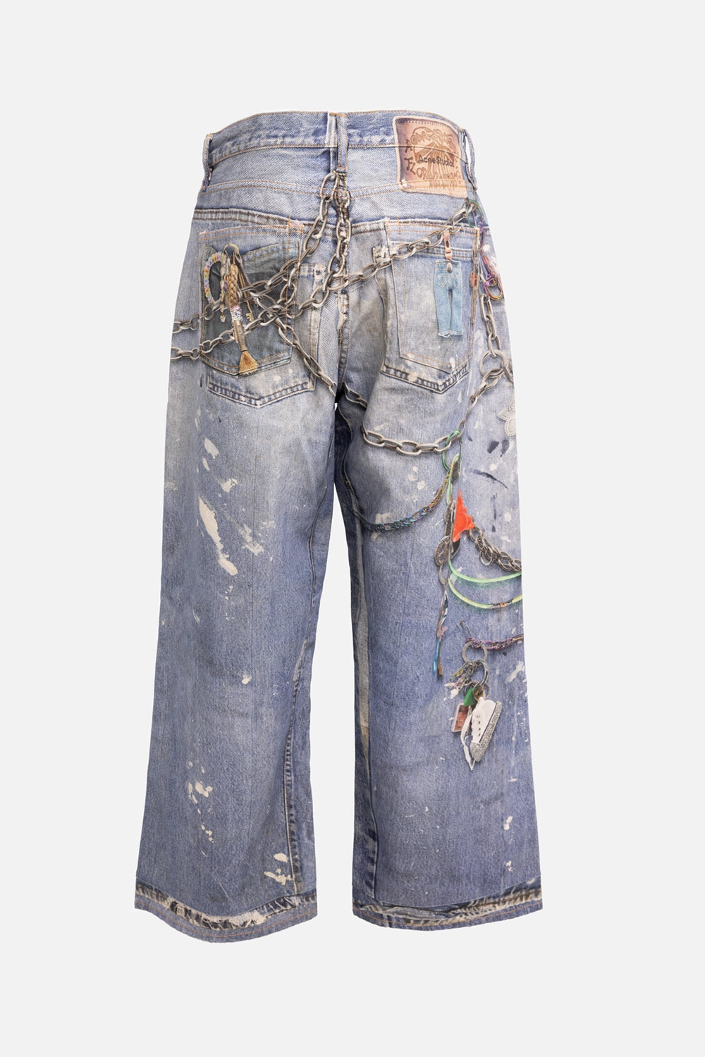 Acne Studios women's pre-owned jeans in mid blue, front view, wide baggy leg with paint splatter and keychain print