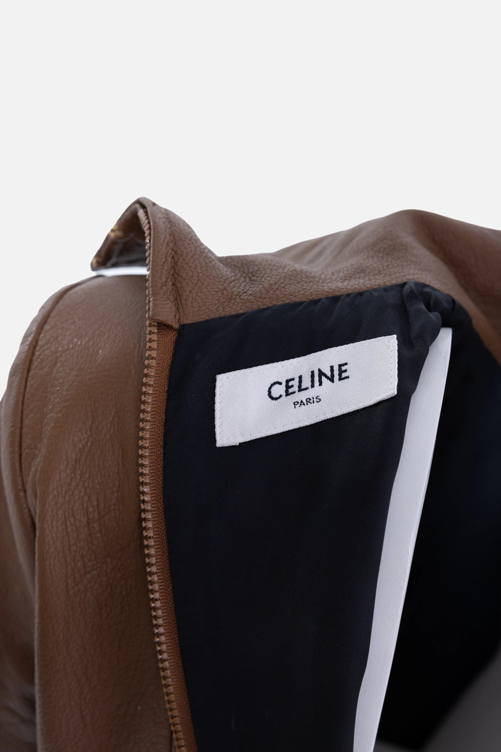 Pre-owned Celine jumpsuit in brown, label view, black lining with CELINE PARIS tag