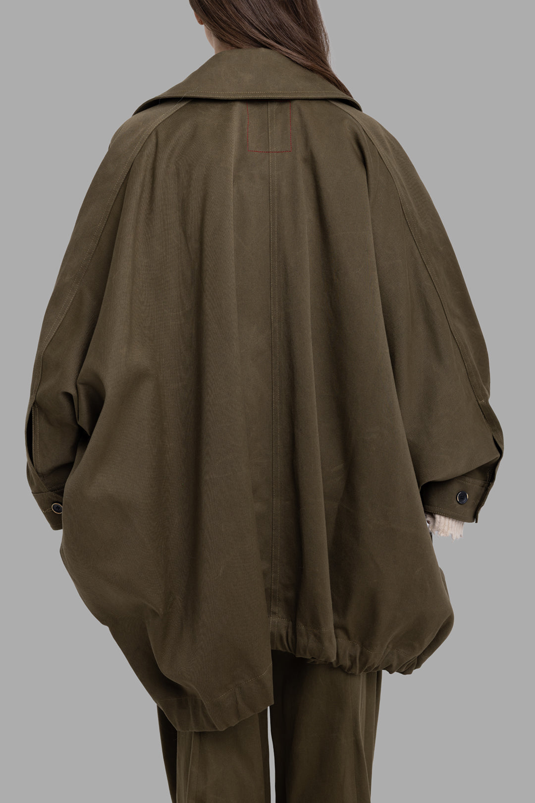 Uma Wang women's dark green Kew jacket, back view highlighting cocooned cape shape and gathered hem