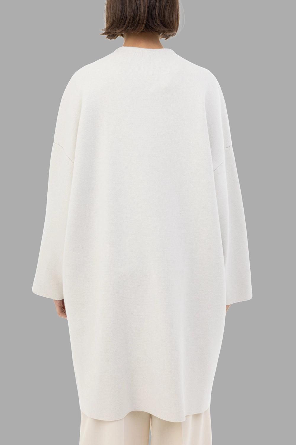Gentry Portofino women knit coat in Stucco, back view, clean back with curved hem
